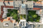 Wohnhaus - Luftaufnahme - Urbanes Wohnen mit Gartenidylle – Stilvolle 2-Zimmer-Wohnung mit privatem Garten