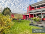Umgehender Garten - Wohn- und Geschäftshaus mit umgebendem Garten, Terrasse und Garage